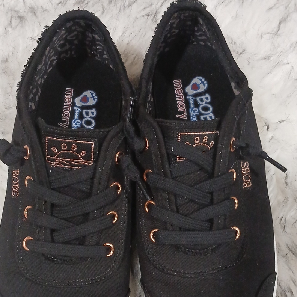 Skechers  Black and Copper Sneakers Size 6 Woman